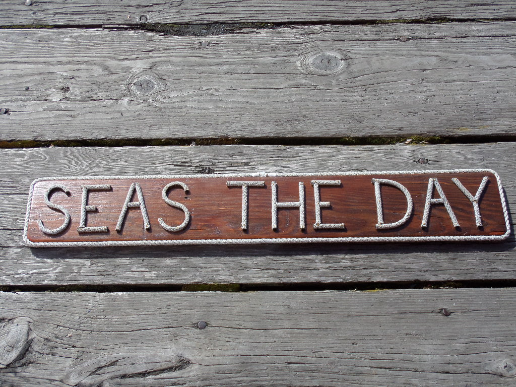 SEAS THE DAY sign - Alaska Rug Company