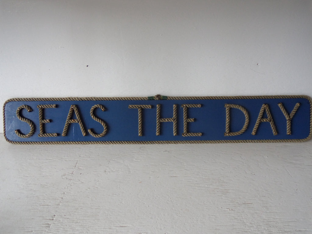 SEAS THE DAY sign - Alaska Rug Company