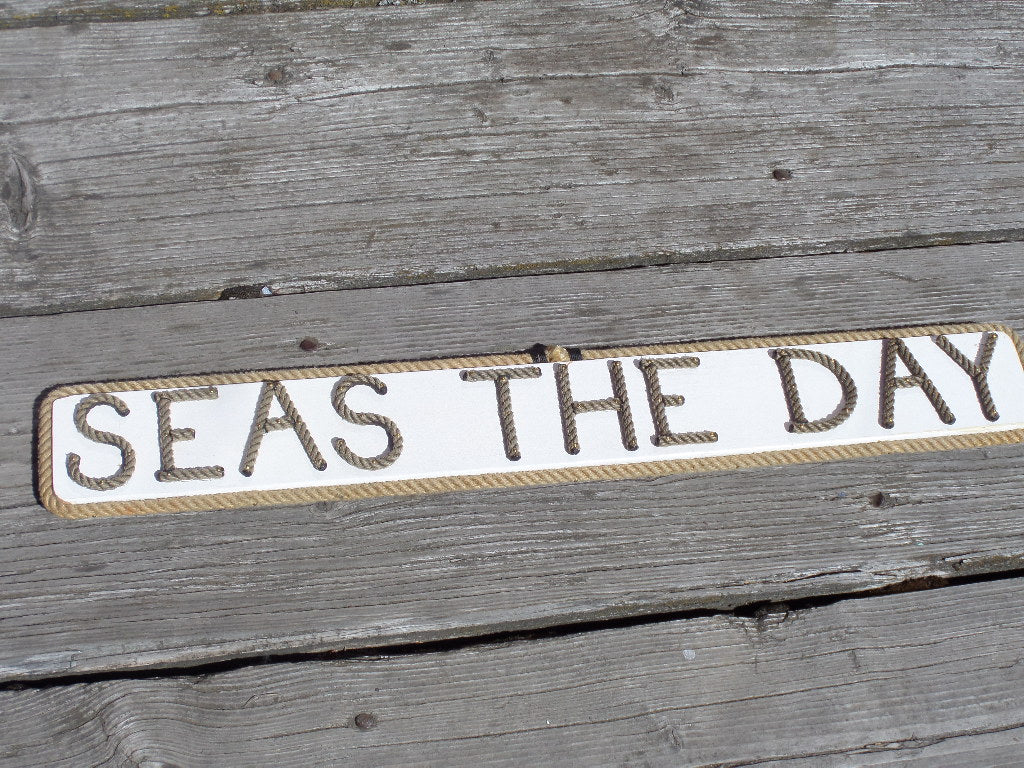 SEAS THE DAY sign - Alaska Rug Company