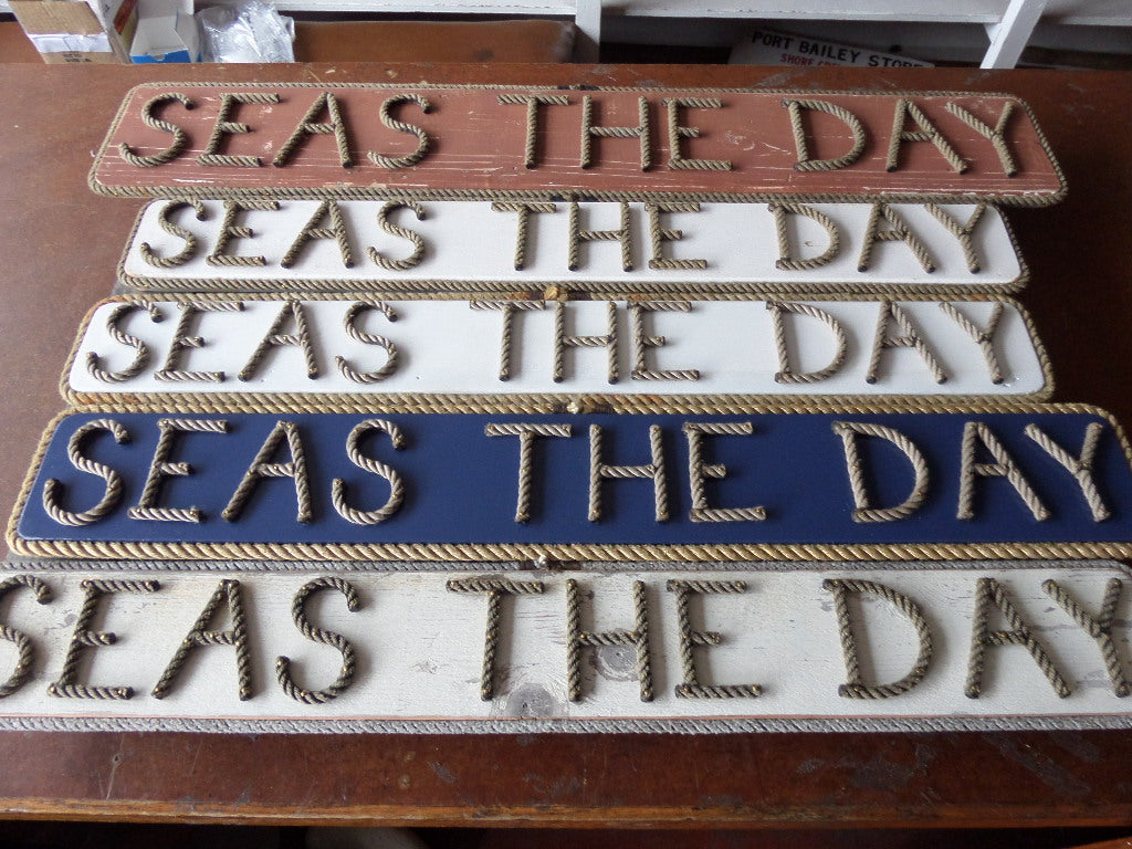 SEAS THE DAY sign - Alaska Rug Company