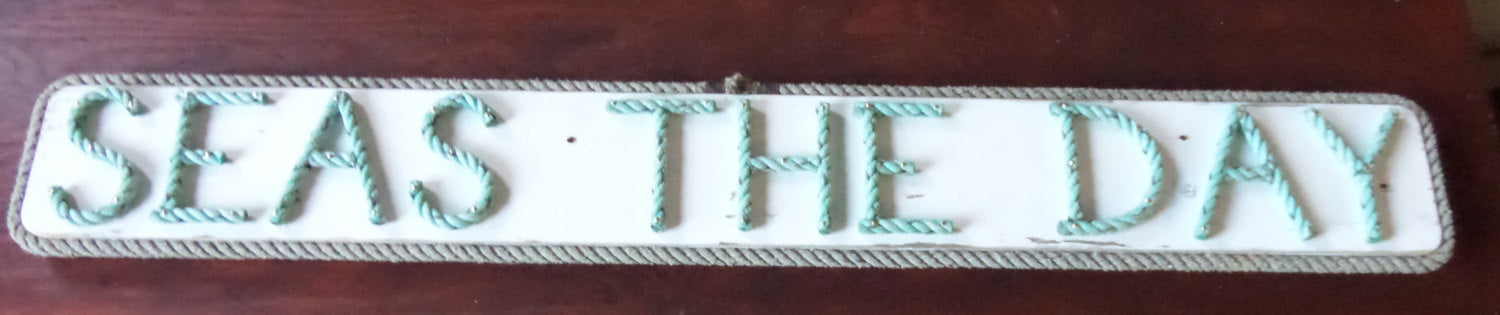 SEAS THE DAY sign - Alaska Rug Company
