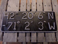 Latitude & Longitude Sign - Alaska Rug Company